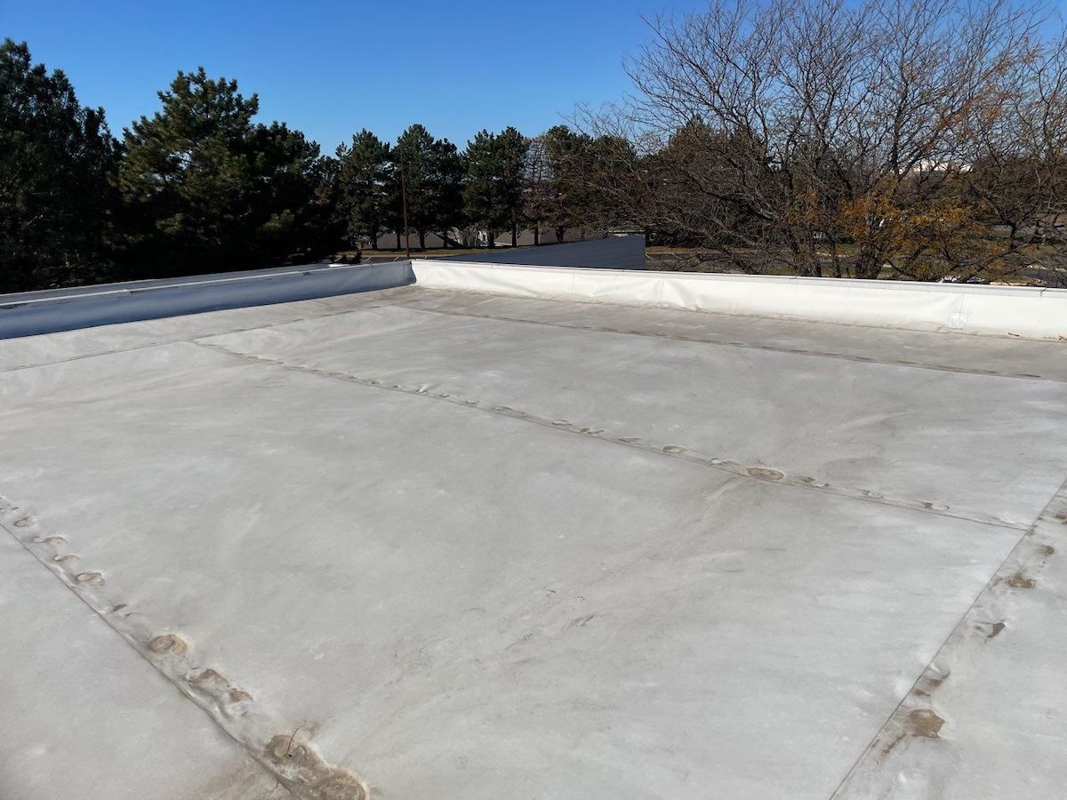 Commercial Roof Coatings: Why Hiring Amateurs Can Cost You Big Time (And How to Choose Well)